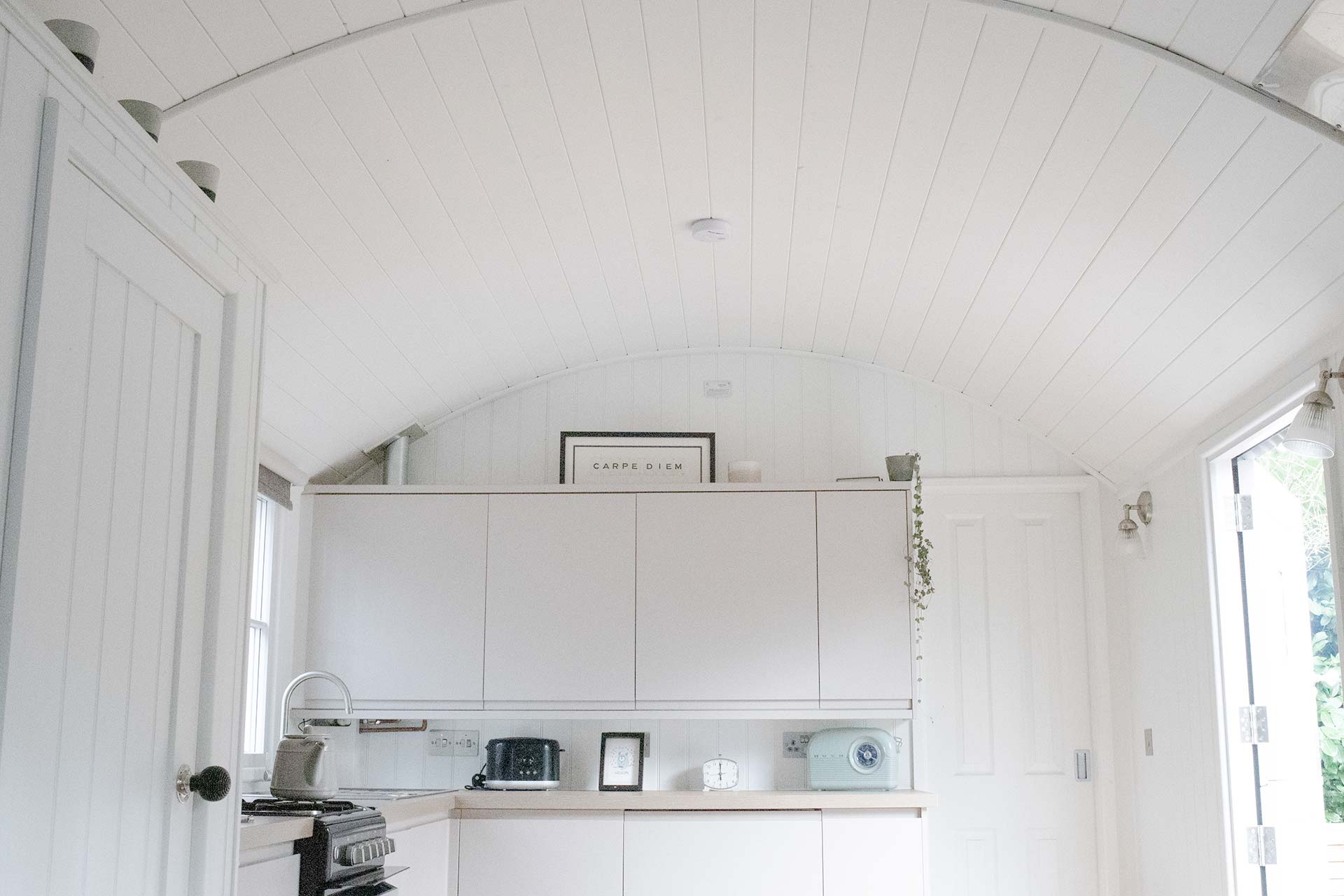 ragnarr inside looking up at the curved roof
